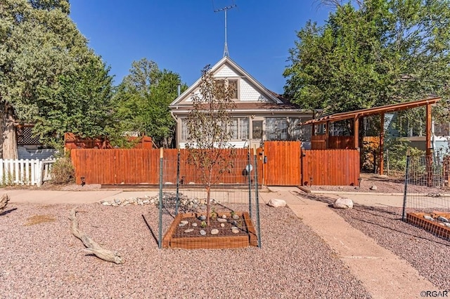 view of playground with a fenced front yard