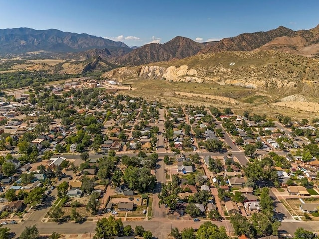 drone / aerial view with a residential view and a mountain view