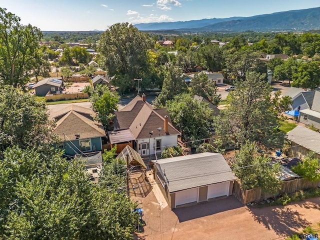 drone / aerial view with a residential view and a mountain view