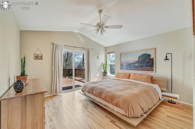bedroom featuring light wood-type flooring, access to exterior, baseboards, and vaulted ceiling