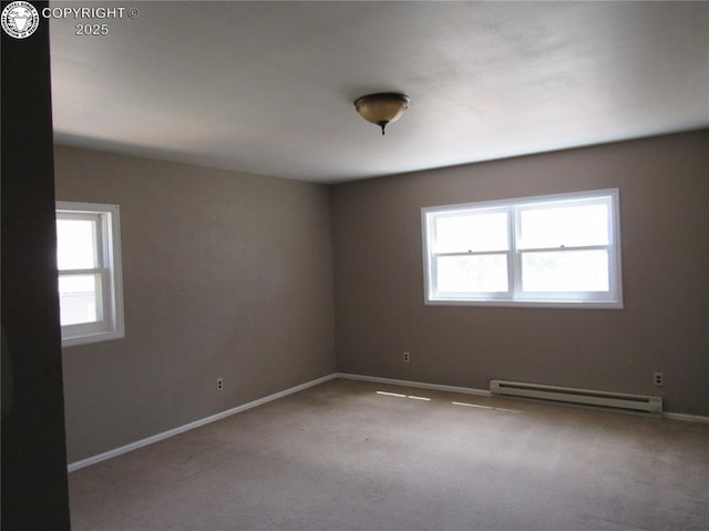855 Ernest Ave, Westcliffe, CO 81252 - carpeted empty room featuring baseboard heating and baseboards