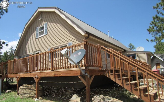 855 Ernest Ave, Westcliffe, CO 81252 - back of property with a wooden deck and stairs