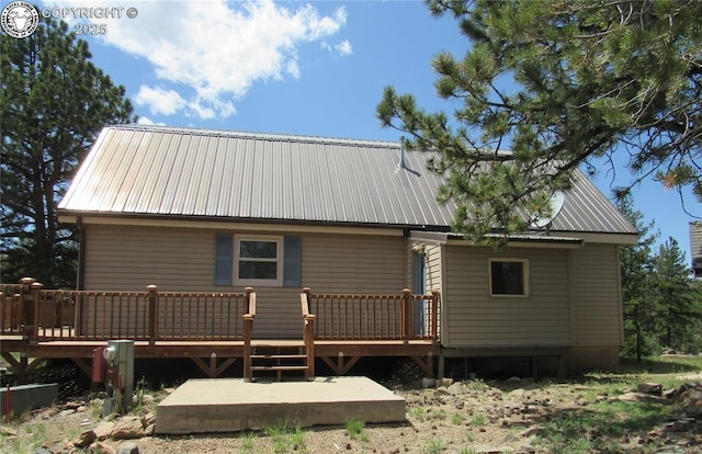 855 Ernest Ave, Westcliffe, CO 81252 - rear view of house featuring a metal roof and a deck