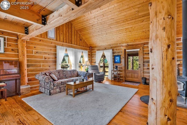 living room with wood ceiling, hardwood / wood-style flooring, high vaulted ceiling, and beamed ceiling