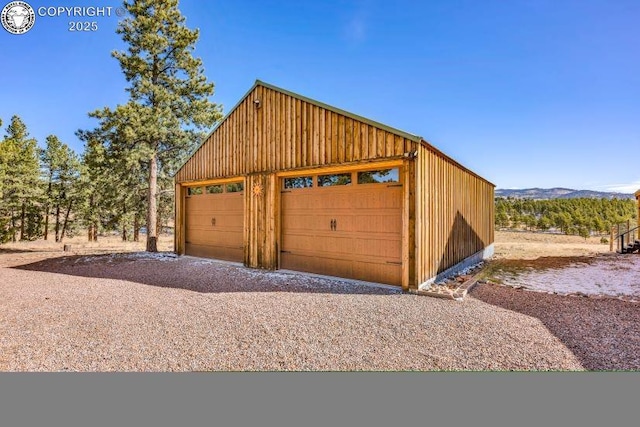 garage featuring a mountain view