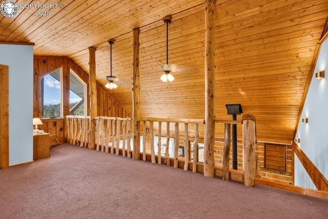 bonus room with wood ceiling, carpet flooring, lofted ceiling, and wooden walls