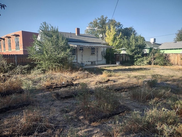 rear view of property with a patio area