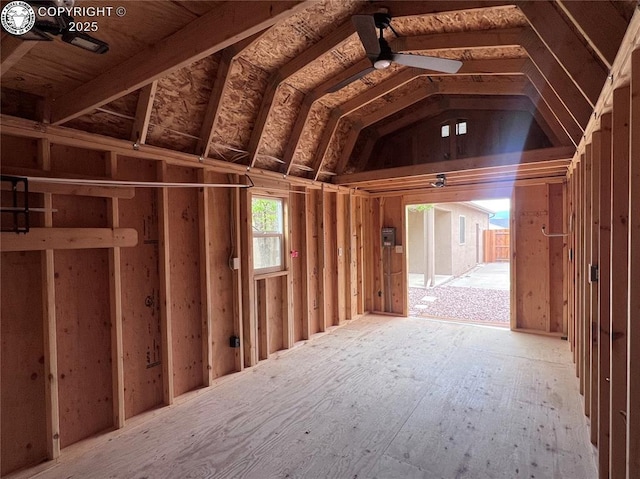 miscellaneous room with a ceiling fan and vaulted ceiling