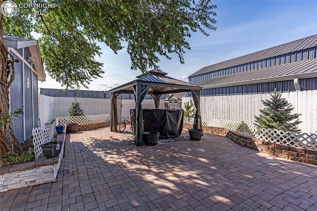 855 5th St, Penrose, CO 81240 - view of patio featuring a gazebo and a fenced backyard