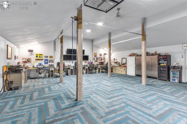855 5th St, Penrose, CO 81240 - below grade area with carpet, a desk, and ceiling fan