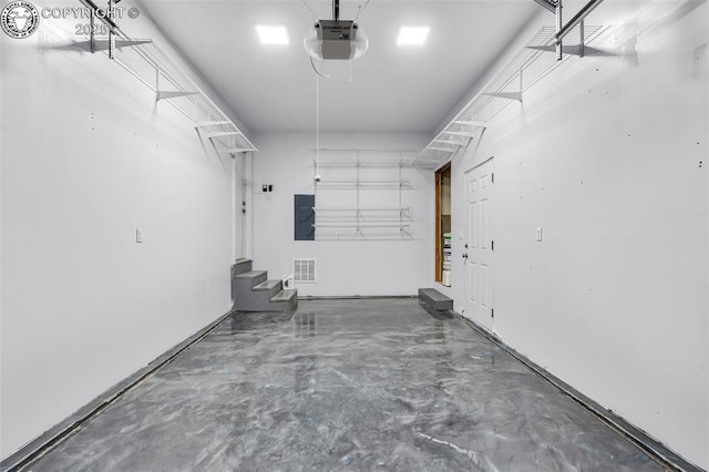 855 5th St, Penrose, CO 81240 - garage with a garage door opener and electric panel