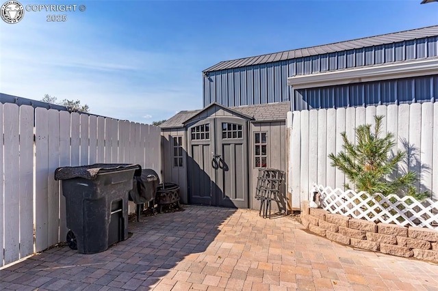 855 5th St, Penrose, CO 81240 - view of patio / terrace with a storage shed, a fenced backyard, and an outdoor structure