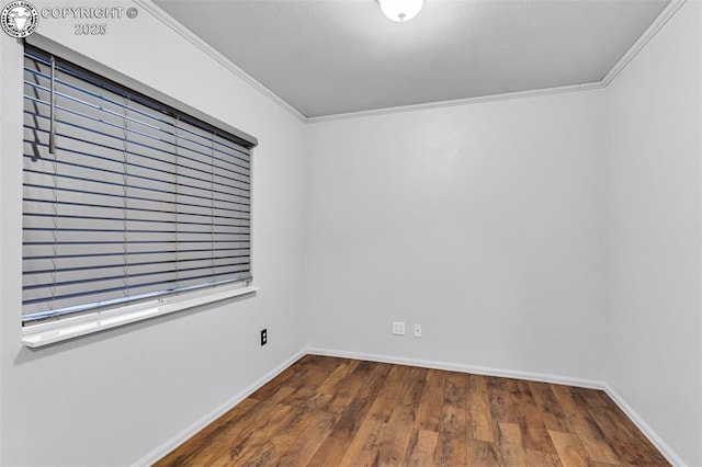 855 5th St, Penrose, CO 81240 - empty room with hardwood / wood-style floors, crown molding, and baseboards