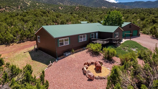 drone / aerial view featuring a mountain view