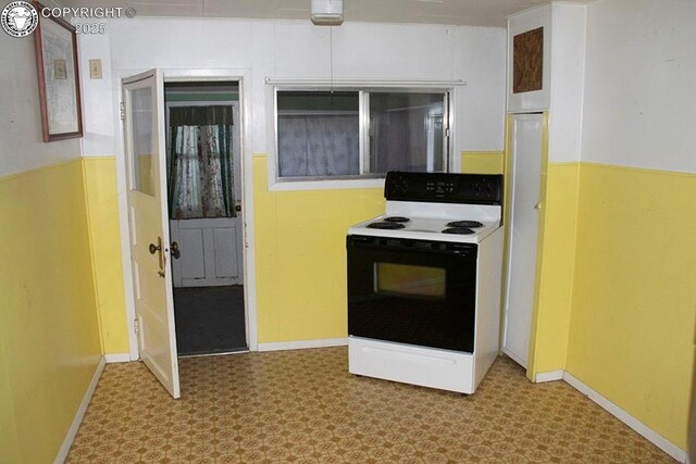485 Spring Ave, Rockvale, CO 81244 - kitchen with range with electric cooktop and tile patterned floors
