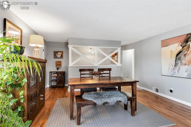 office with dark hardwood / wood-style floors