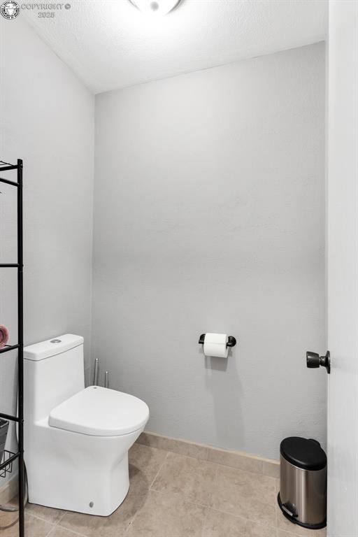 bathroom featuring toilet