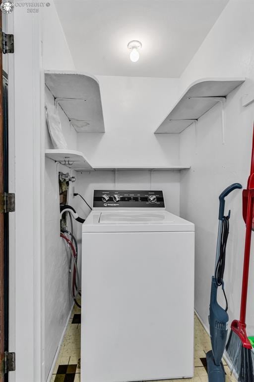 1035 Ohio Ave, Canon City, CO 81212 - laundry area with washer / dryer and light flooring