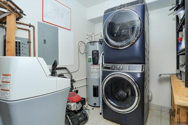 laundry area with stacked washer / dryer, electric panel, water heater, and light tile patterned floors