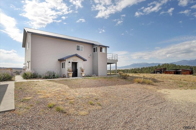 view of front of home with a mountain view