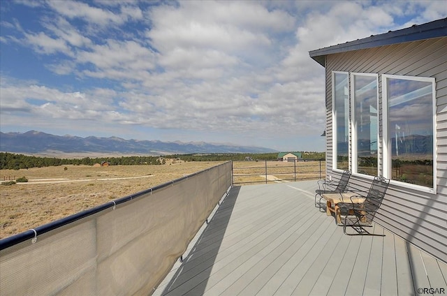 wooden terrace with a mountain view