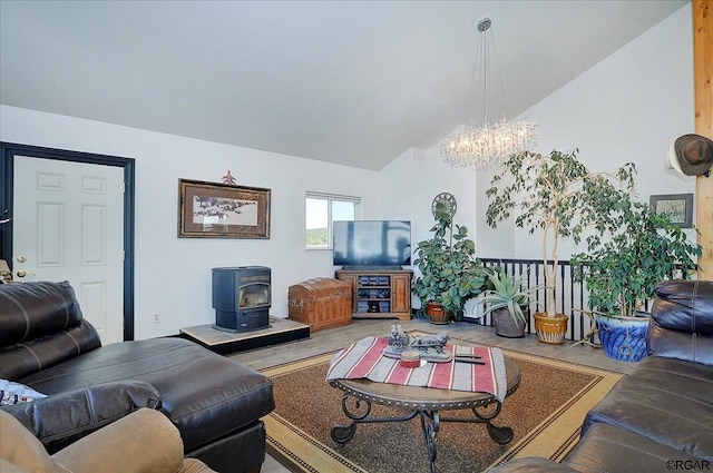 living room featuring lofted ceiling and a wood stove