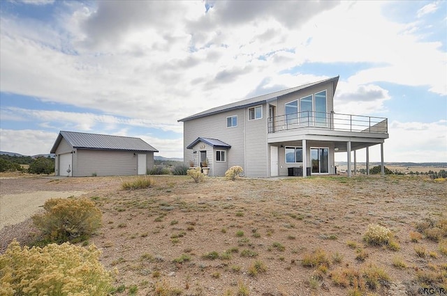 rear view of house with a deck