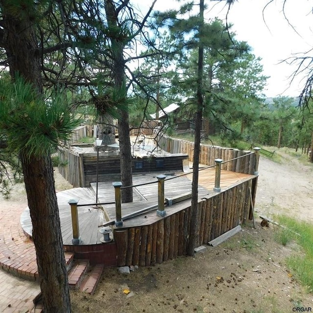 view of home's exterior with a wooden deck