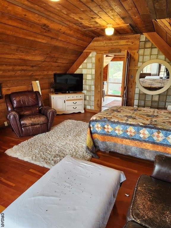 bedroom with wood-type flooring, lofted ceiling, and wooden ceiling