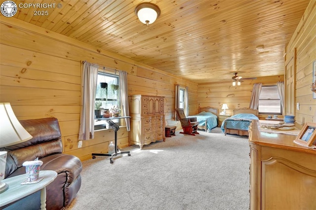 bedroom featuring wooden walls, carpet flooring, and wood ceiling