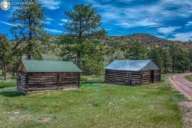 property view of mountains with a forest view