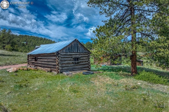 view of outbuilding with an outbuilding