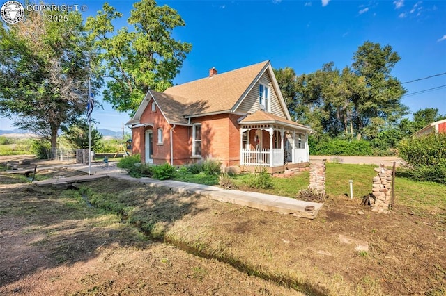 view of front of home featuring covered porch