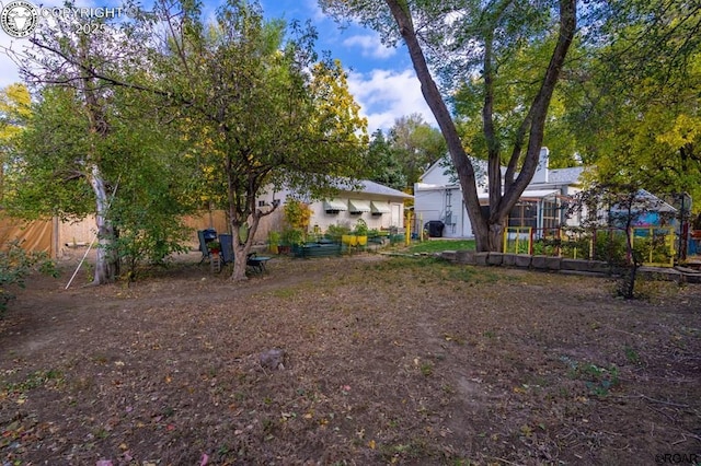 view of yard featuring fence