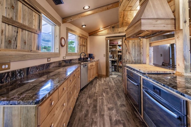 kitchen with black oven, dishwasher, premium range hood, vaulted ceiling with beams, and dark hardwood / wood-style flooring