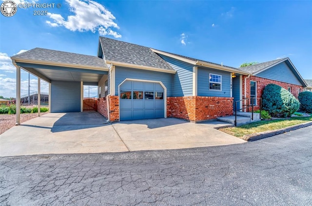 1108 Fairview Ave Unit B, Canon City, CO 81212 - view of front facade with brick siding, concrete driveway, an attached garage, an attached carport, and a shingled roof