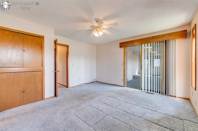 1108 Fairview Ave Unit B, Canon City, CO 81212 - unfurnished bedroom with carpet floors, access to outside, ceiling fan, and a textured ceiling
