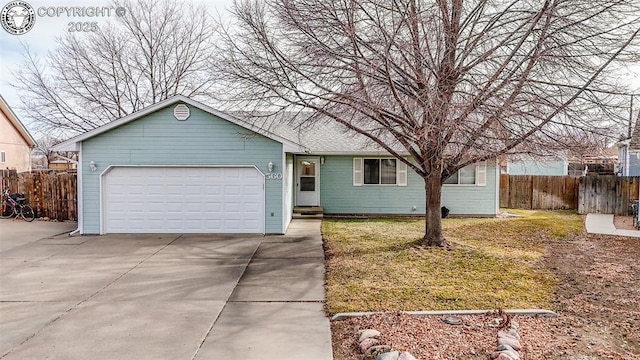 ranch-style home with a garage