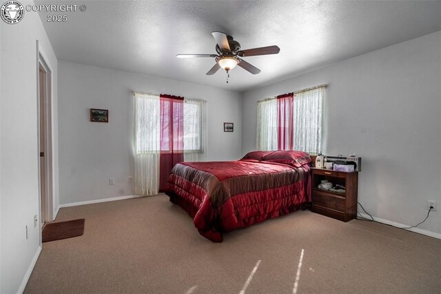 bedroom featuring carpet floors and ceiling fan