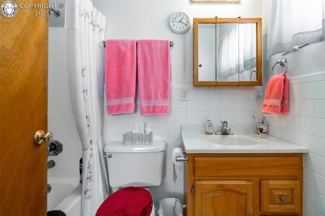 full bathroom with vanity, toilet, and shower / bath combo