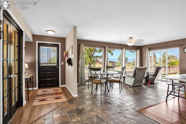 925 2nd St, Penrose, CO 81240 - entryway with stone tile flooring and ceiling fan