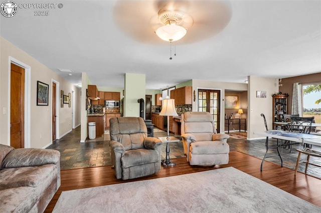 925 2nd St, Penrose, CO 81240 - living area featuring ceiling fan and dark wood-type flooring