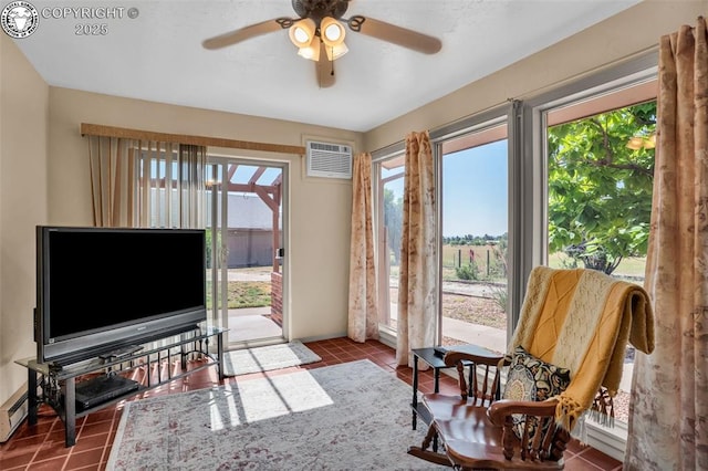 925 2nd St, Penrose, CO 81240 - living area with tile patterned flooring, ceiling fan, and an AC wall unit