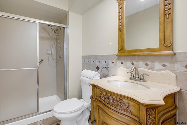 bathroom featuring walk in shower, vanity, and toilet