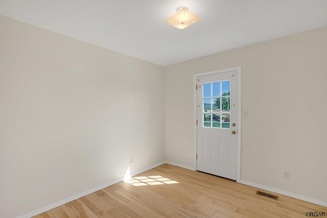 empty room featuring light wood-type flooring