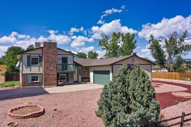 tri-level home featuring a garage