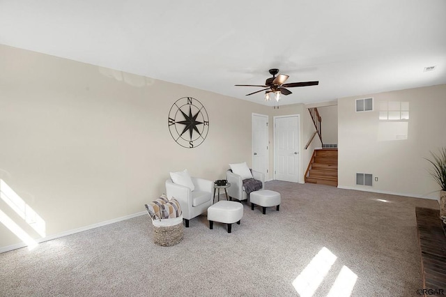 unfurnished room with carpet floors and ceiling fan