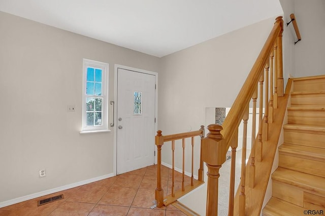 view of tiled foyer entrance