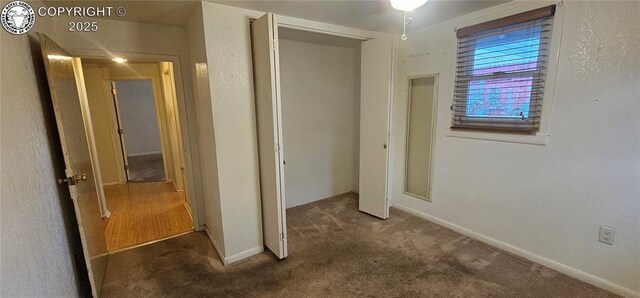 1540 Lombard St, Canon City, CO 81212 - unfurnished bedroom featuring carpet and a closet