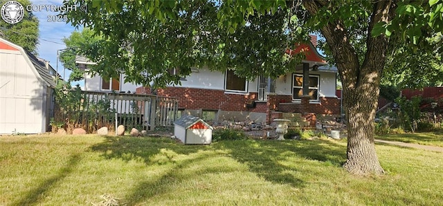 1540 Lombard St, Canon City, CO 81212 - rear view of property featuring brick siding